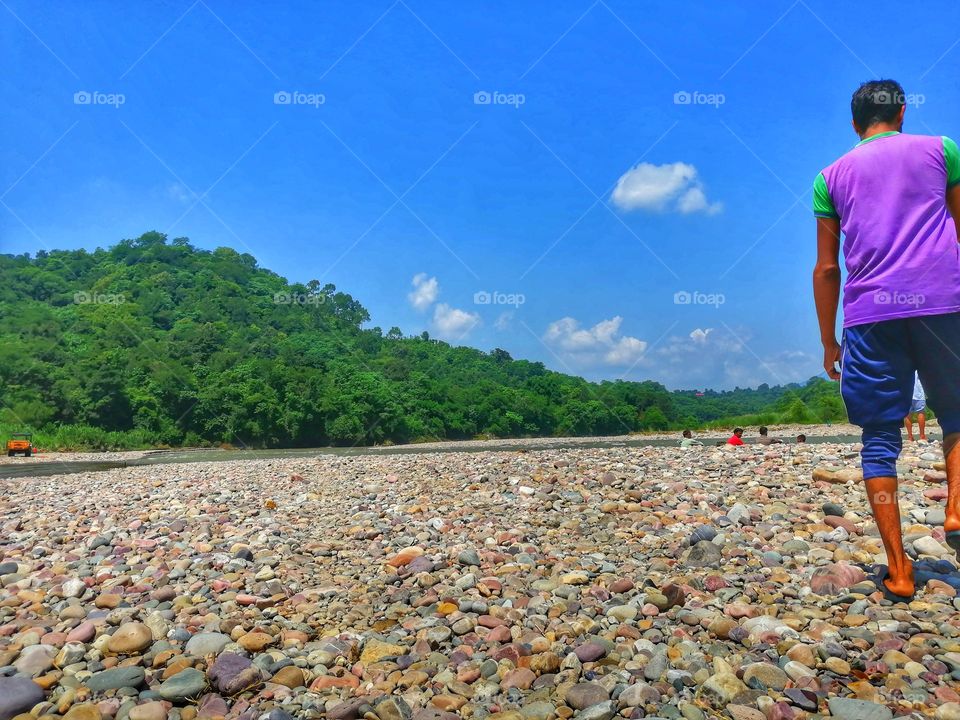 River Bank and neat and clean sky blue background