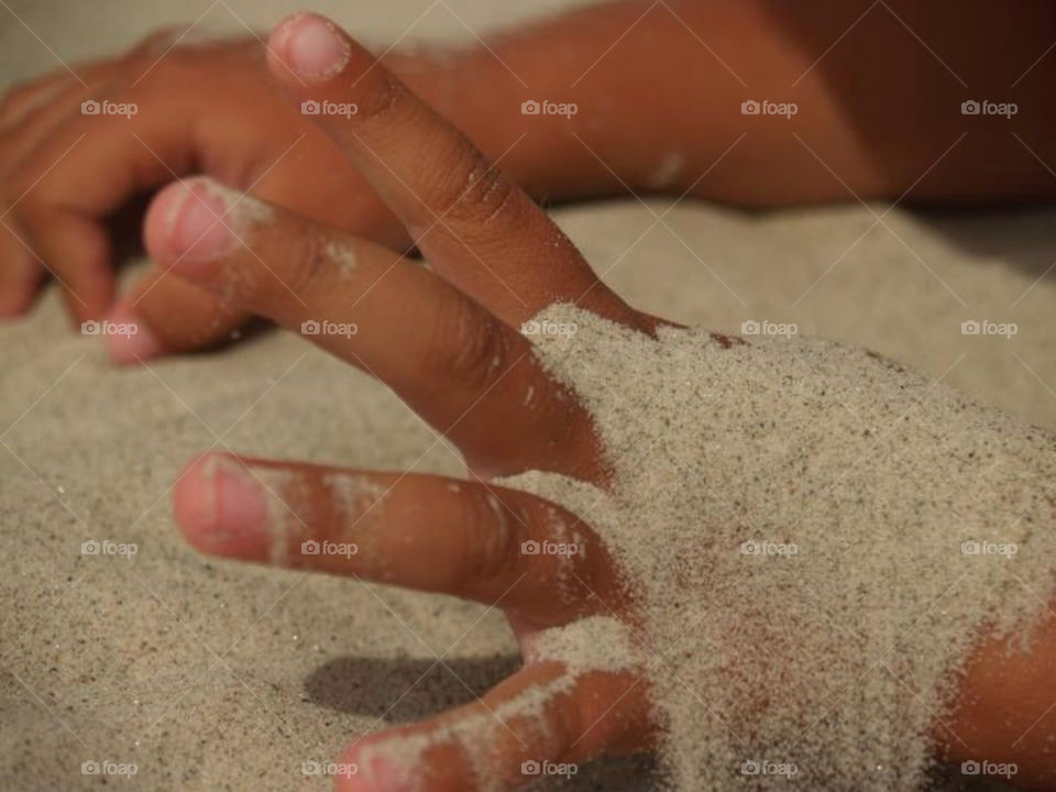 My little boys hand in the sand :)