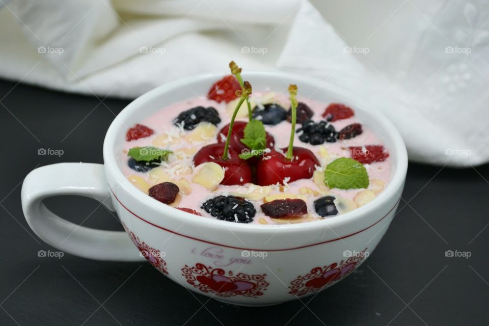 Fruit dessert in ceramic cup