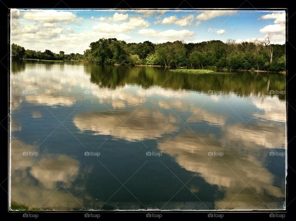 Cloud reflections . Clouds on the Fox River