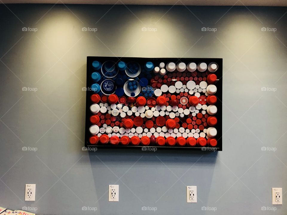 The American flag made out of bottle caps and cups lovely photo taken at local center