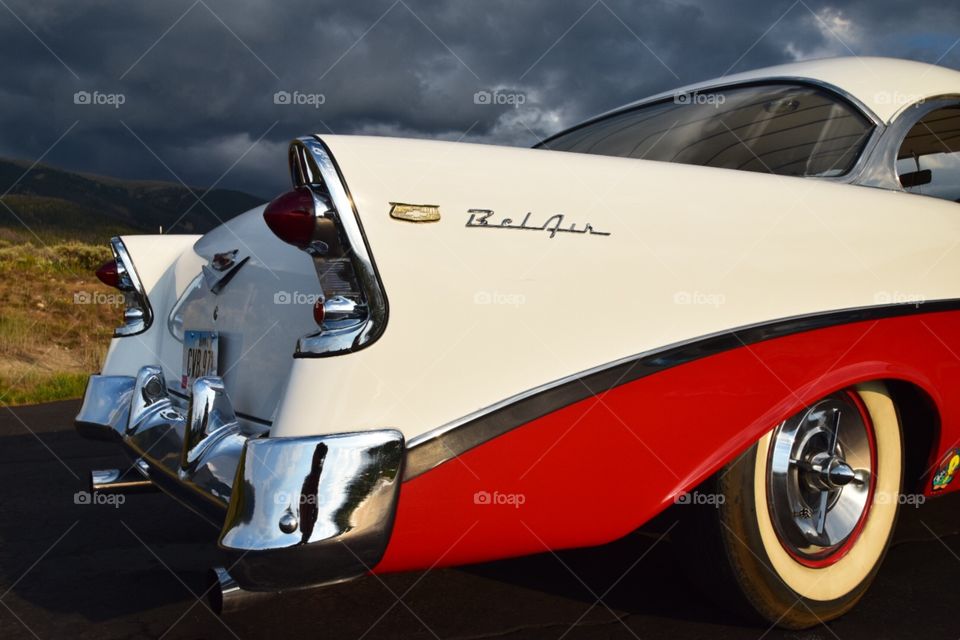 Tail fin of a classic car, red Chevy Bel Air