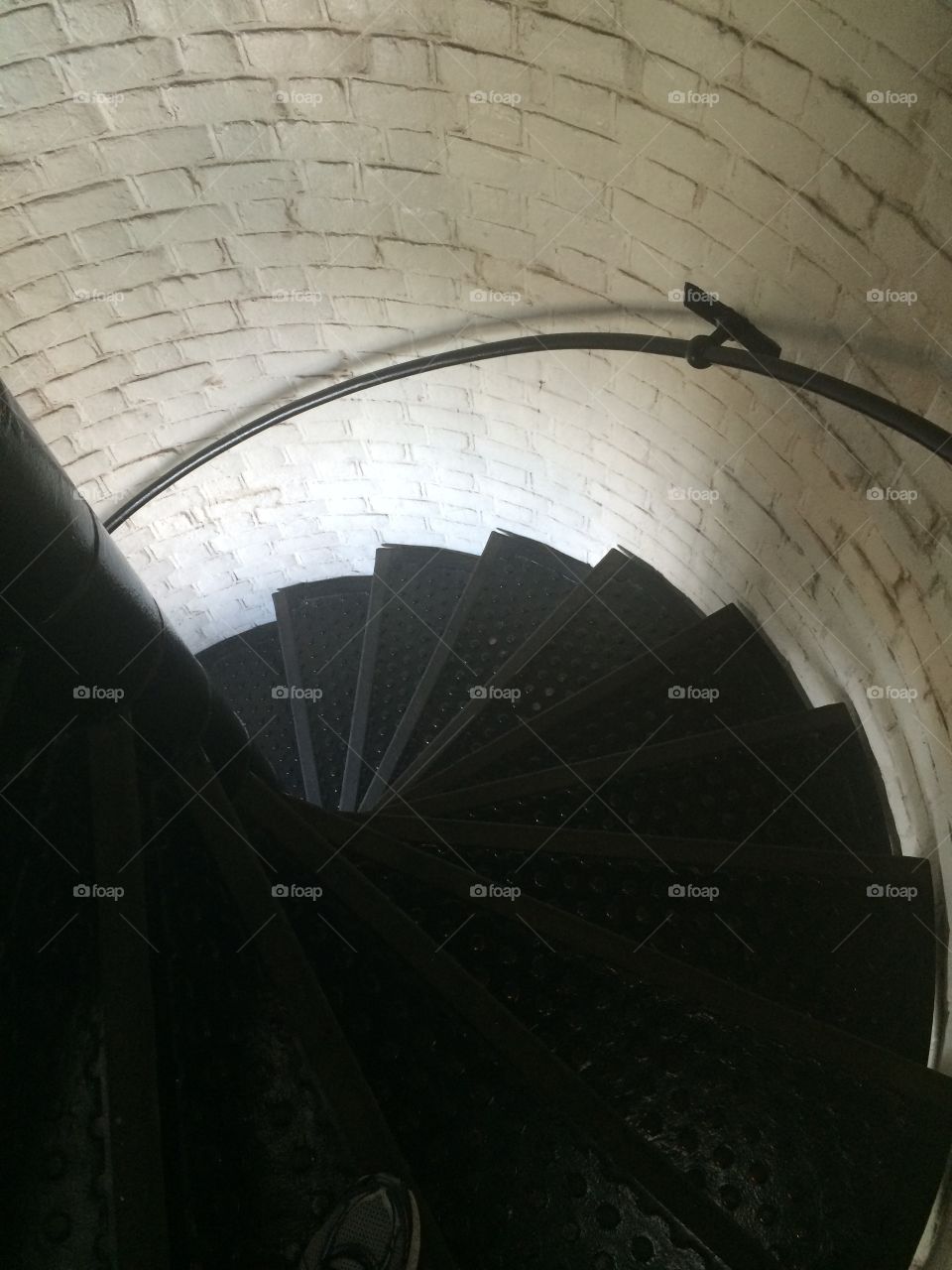 Vertigo-inducing glance down the spiral staircase inside St. Simons Lighthouse, Georgia. 