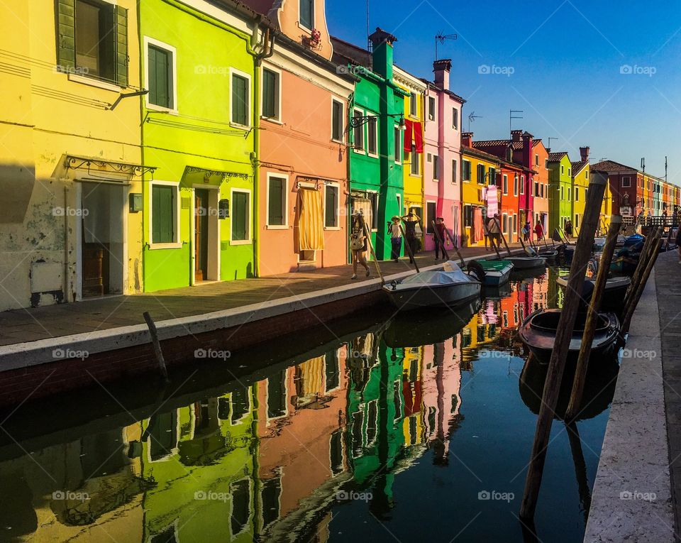 Colourful houses with reflection from the canal