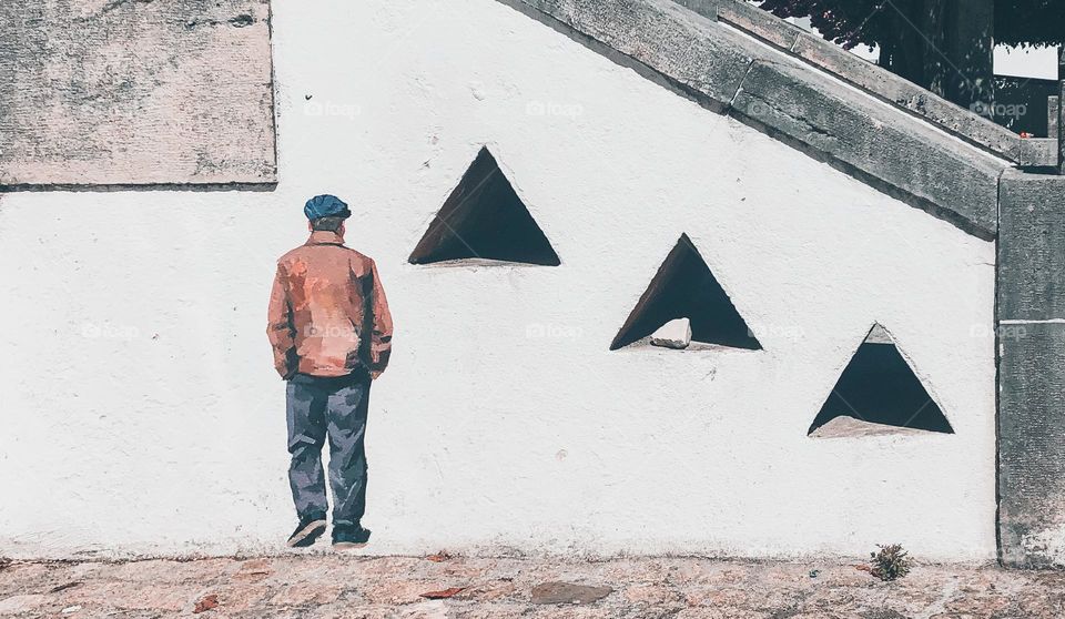 One of Helen Bur's 'miniatures'. Tiny people walking away from us, painted in hidden place around Figueiro dos Vinhos - Portugal 2020