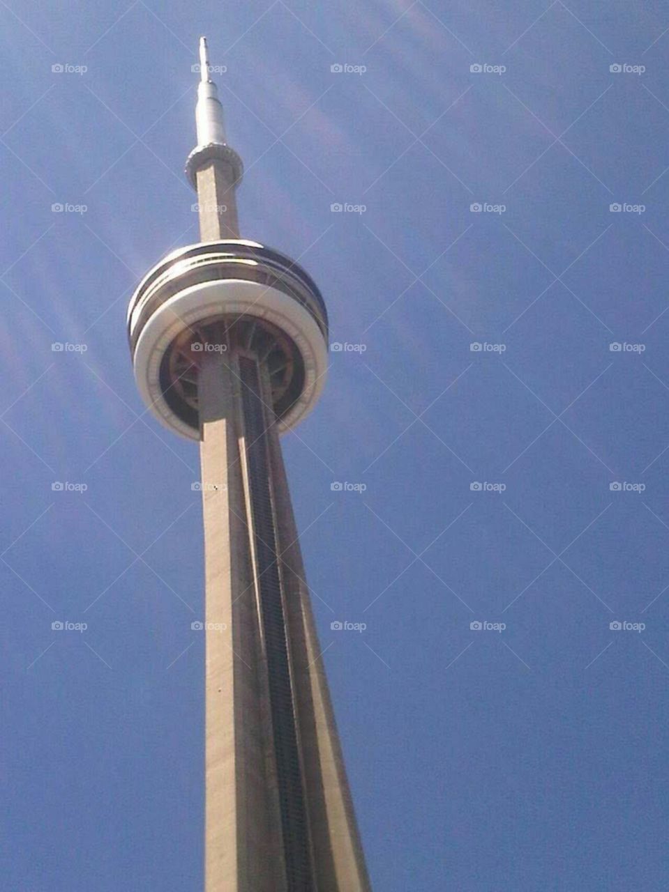 Looking all the way up at Toronto's CN Tower.