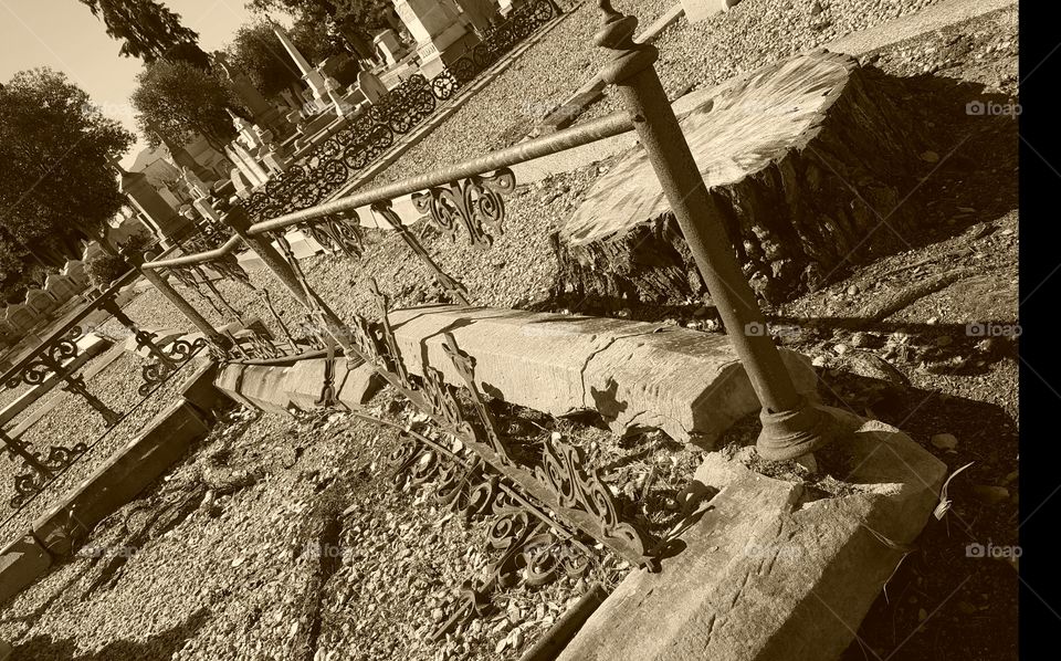 an abandoned gravesite at Santa Clara 
Mision Cemetery.