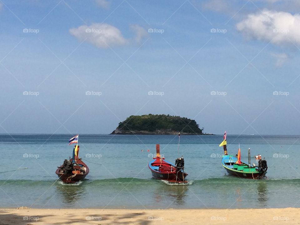 Traditional boats at the coast in Thailand 
