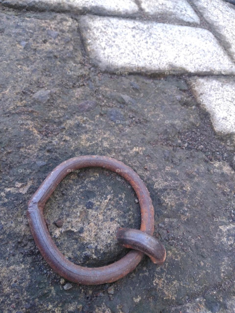 Old iron ring on the ground