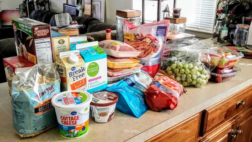 counter full of groceries hauled straight from grocery store