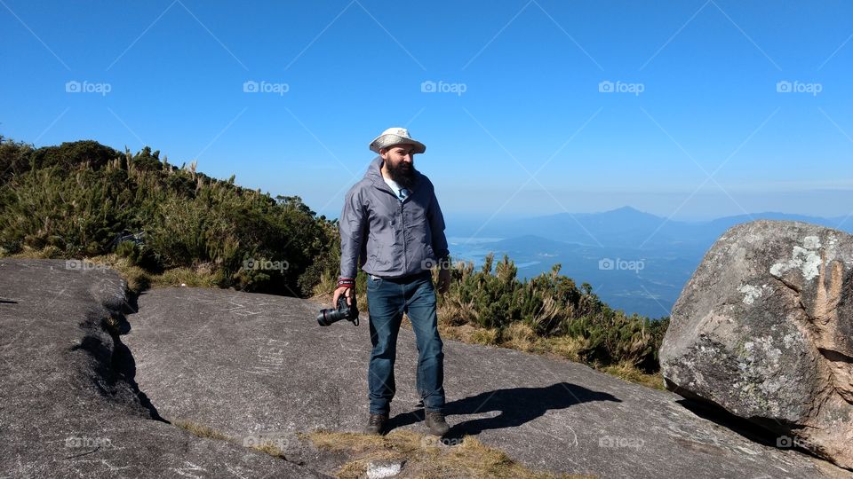 Photographer on top of the mountain.