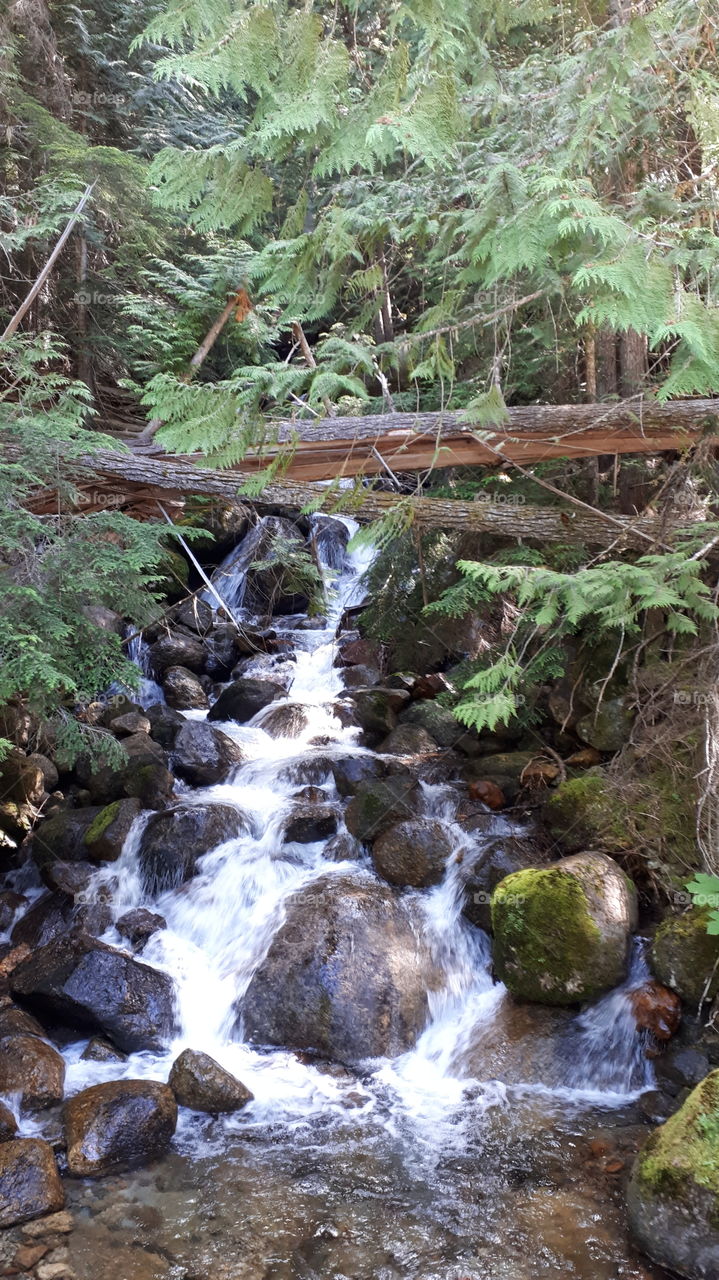 A mountain fall water cascade.