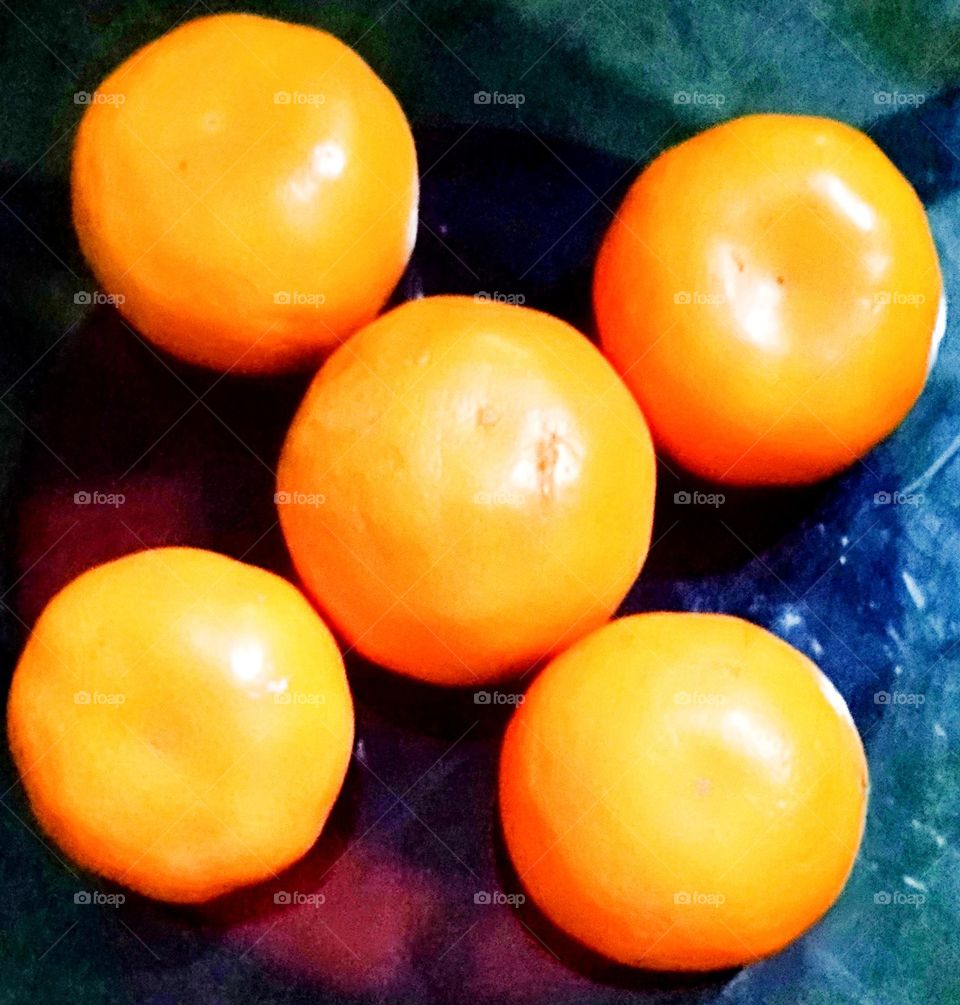 Orange in a two dimensional closed shape.