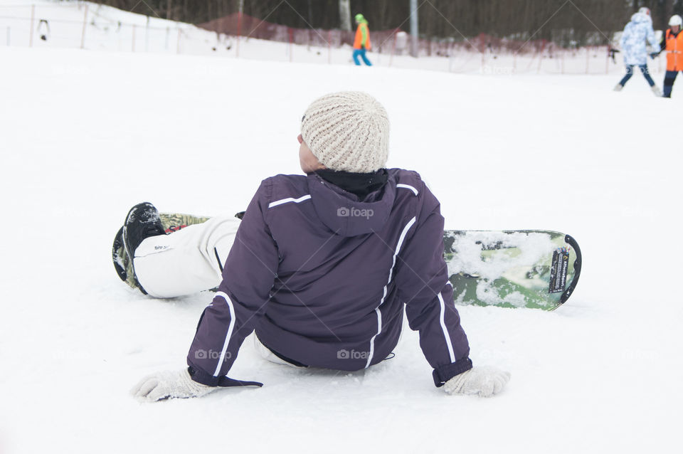 girl in the mountains on snowboard