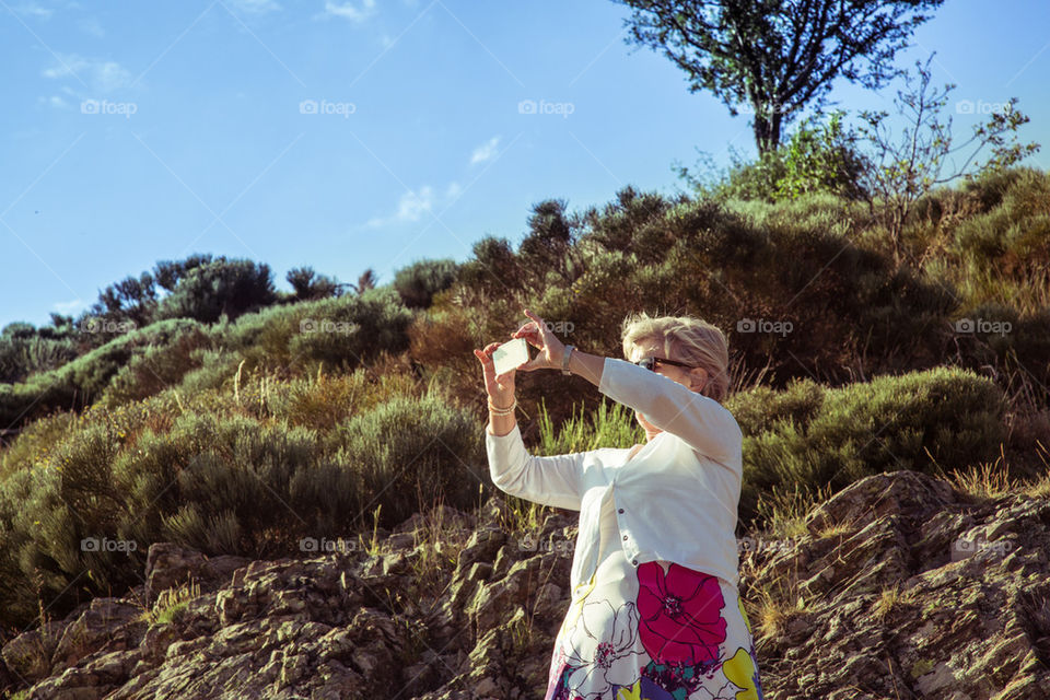 Senior woman with smart phone 