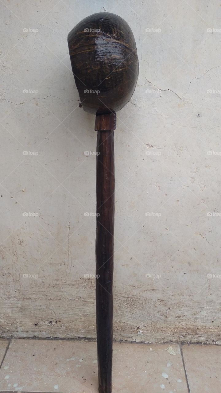 The ancient dipper is made of coconut skin and wood