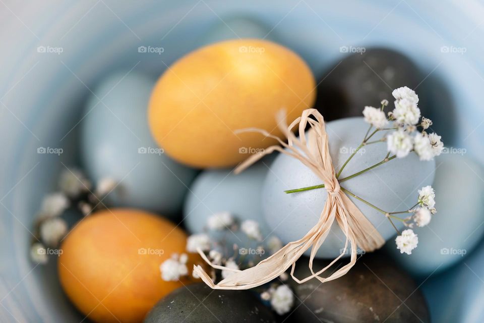 Colored Easter eggs in a bowl