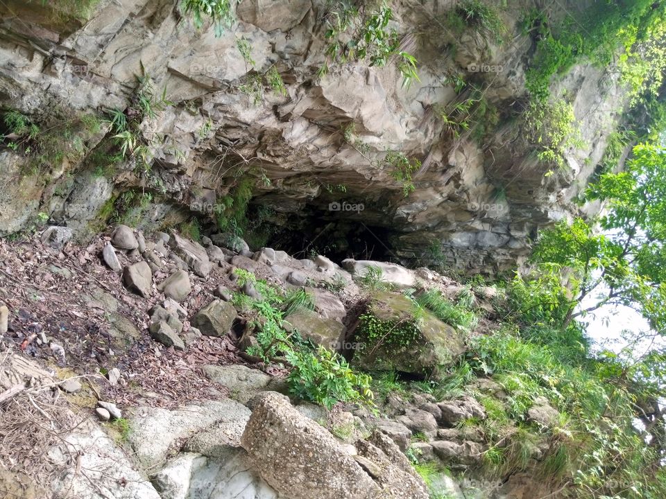 a big cave in the middle of the mountain