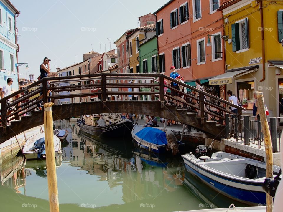 Burano is an island in the Venetian Lagoon, northern Italy, near Torcello at the northern end of the Lagoon, known for its lace work and brightly coloured homes