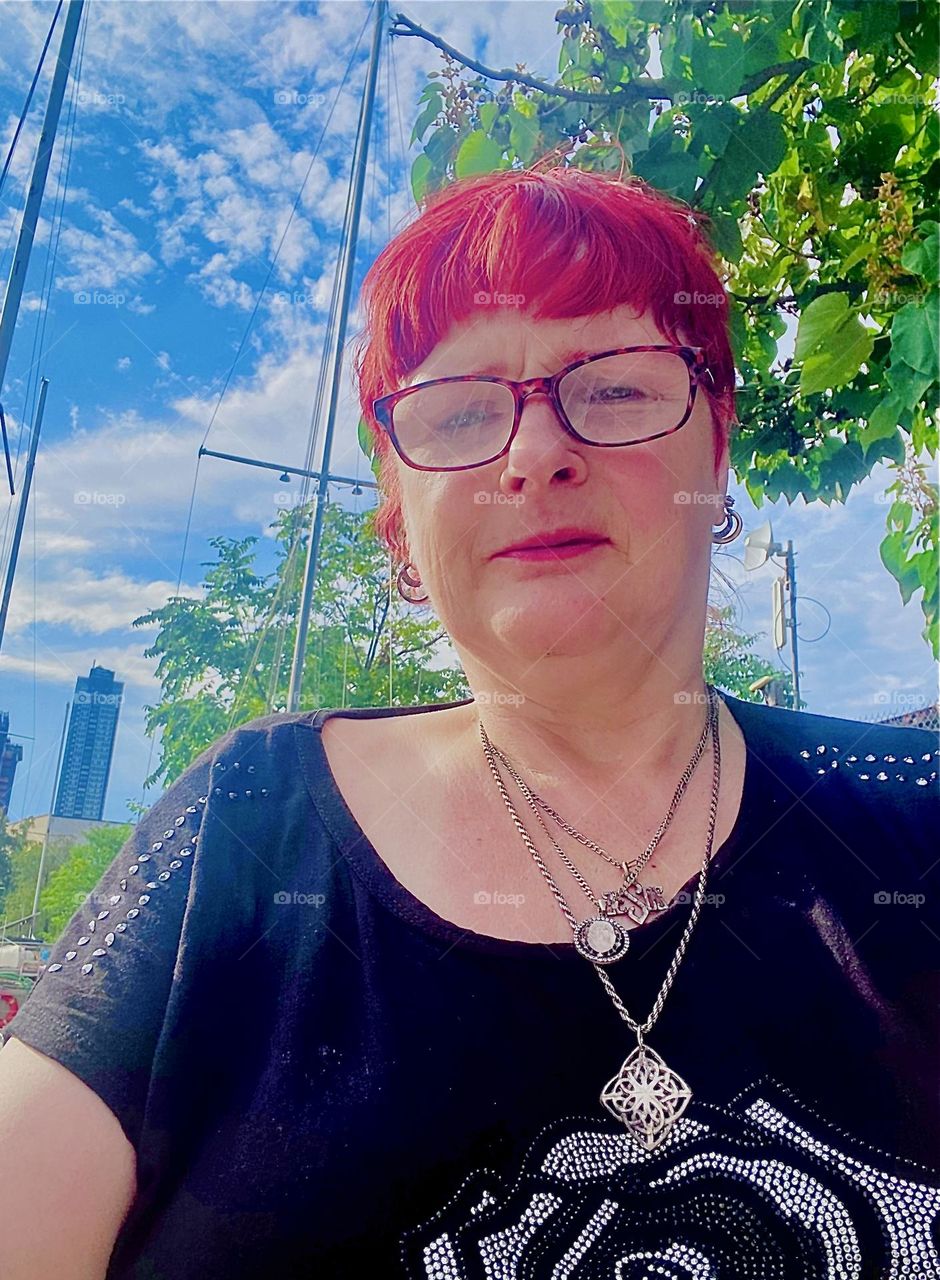 This is me, “Petra Schiller” a.k.a. “Maxine Firefox” enjoying an Indian summer evening aboard “Salvation”, our “28 foot 1969 Luhrs” cabin cruiser tied to the shore at “Newtown Creek” by the “Pulaski Bridge” in LIC, Queens. 2023. Hypnotic Productions