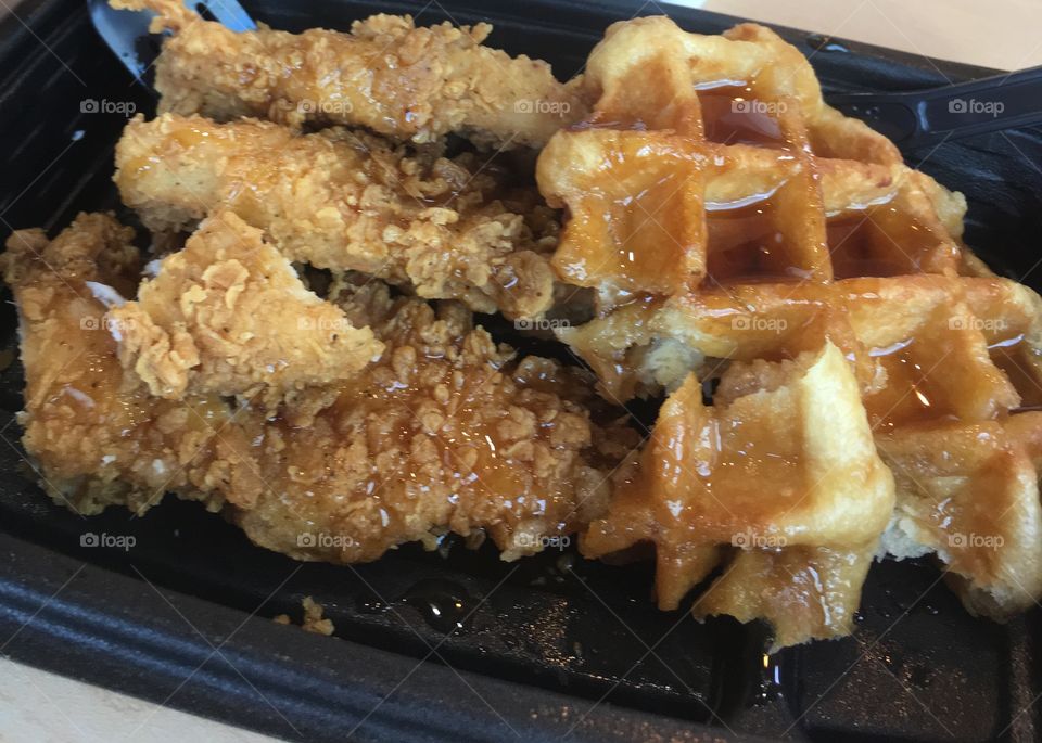Southern chicken and waffles with delicious syrup 