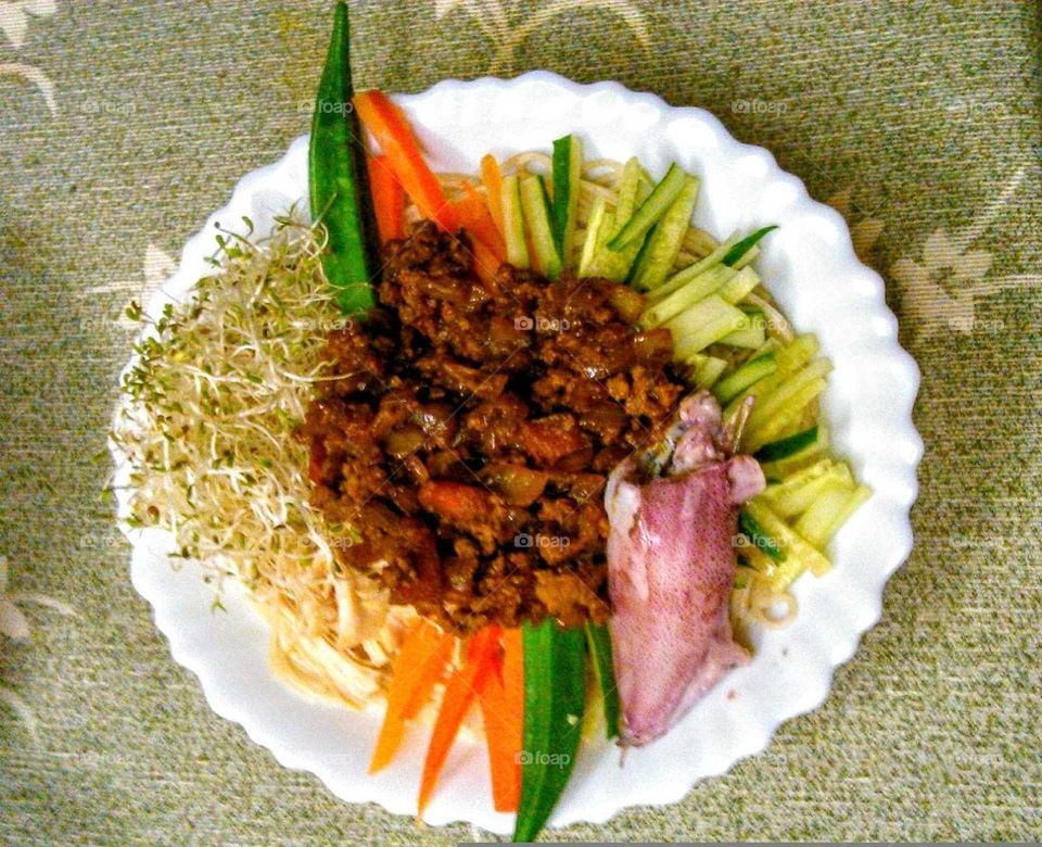 A delicious, colorful braised pork dry noodles in my ordinary lunch, I always put my favourite foods that made a beautiful dish.