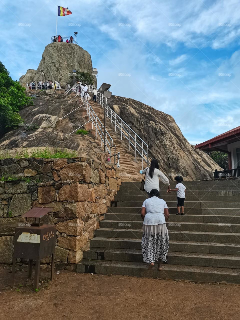 Climb in sacred rock called mihinthale, sri lanka