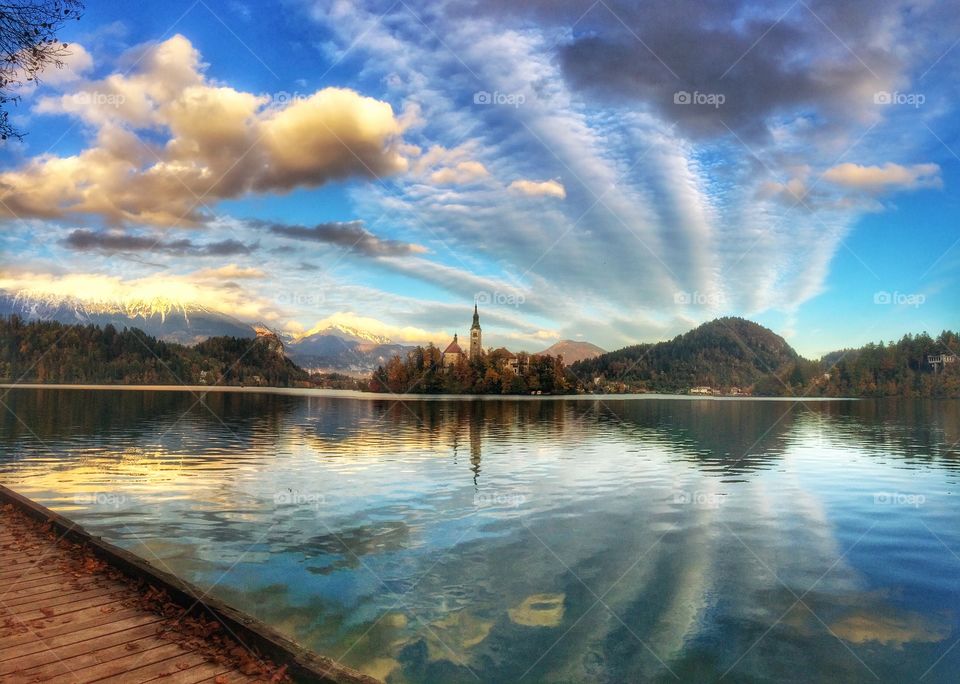 Lake bled with the church and the castle on a calm winter morning