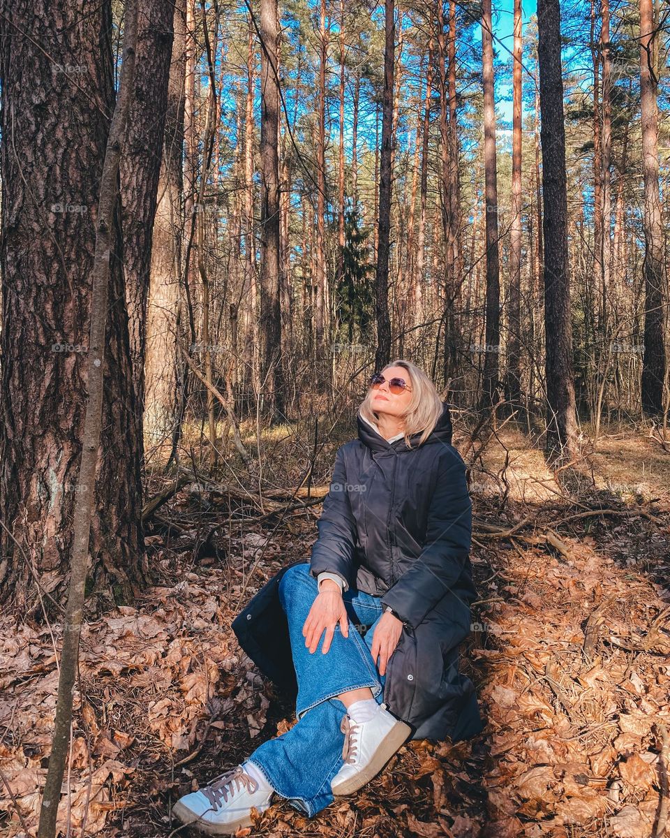A woman in a spring forest.