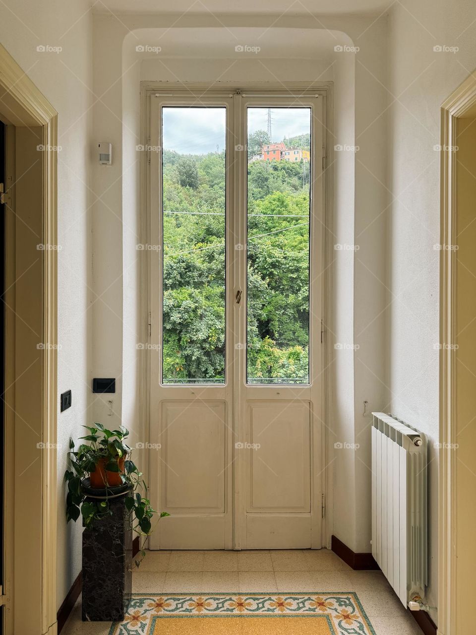 View of a window in a beautiful old house in Italy