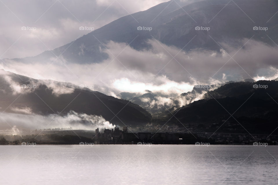 Patras view from Nafpaktos on foggy fall day, Gulf of Corinth