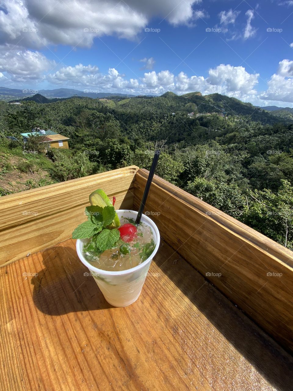 Mojito drink with a see to the mountains.