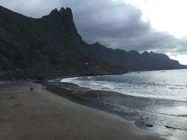 A beach in teneriffe. A cloudy day. The beach is empty.