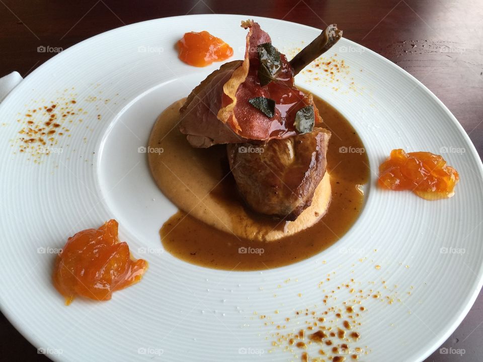 Fancy duck dish with apricot preserves.