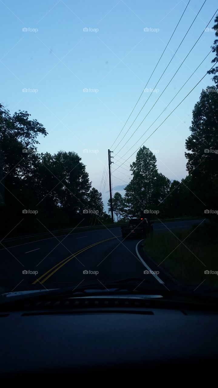 driving through north Carolina mountains at sunrise