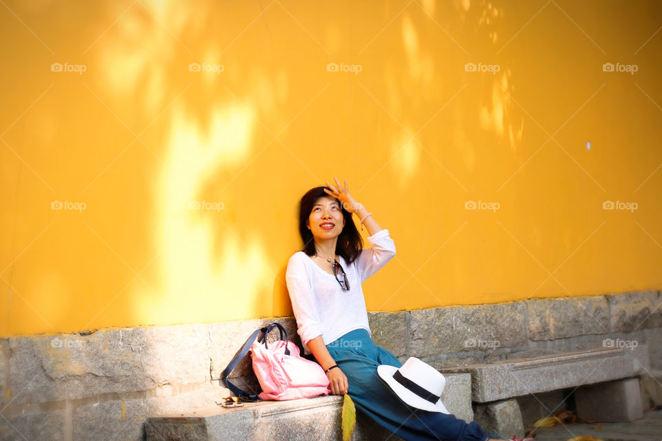 Travel, @Quanzhou, with Monica. Took lots of pics for Monica. A colorful wall in Chengtian temple with amazing sunshine is as the background, some different feeling were crashing my mind...承天寺的黄墙，出片猛烈的地方。