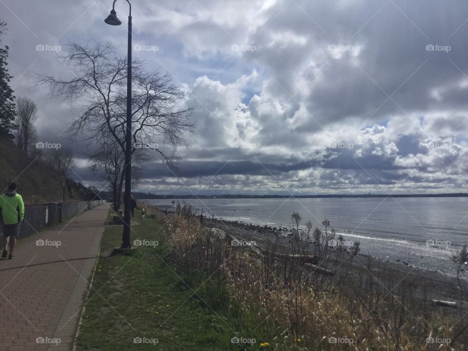 Walking along the Pacific Ocean in White Rock, British Columbia, Canada.