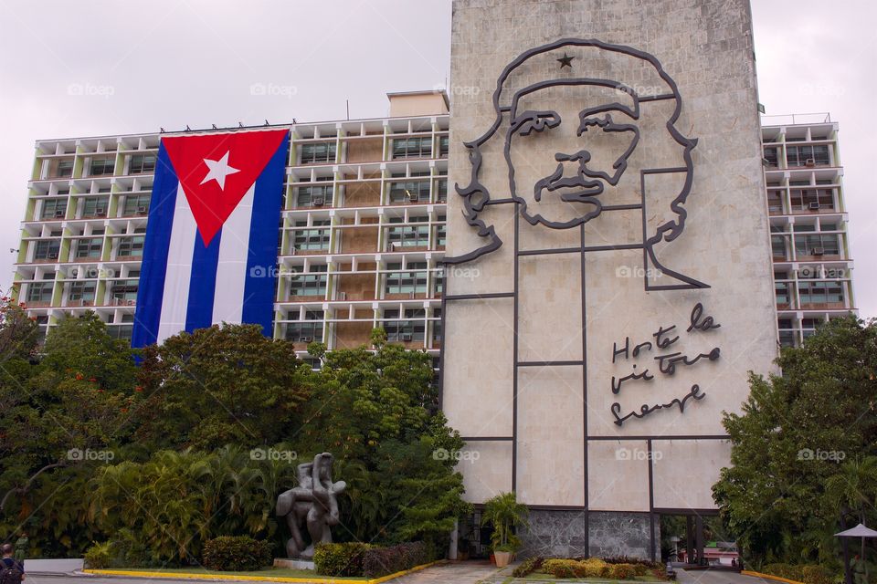 Cuban flag and sumptuary of Che Guevara on facade of Ministry of Interior de la Revolution in Cuba