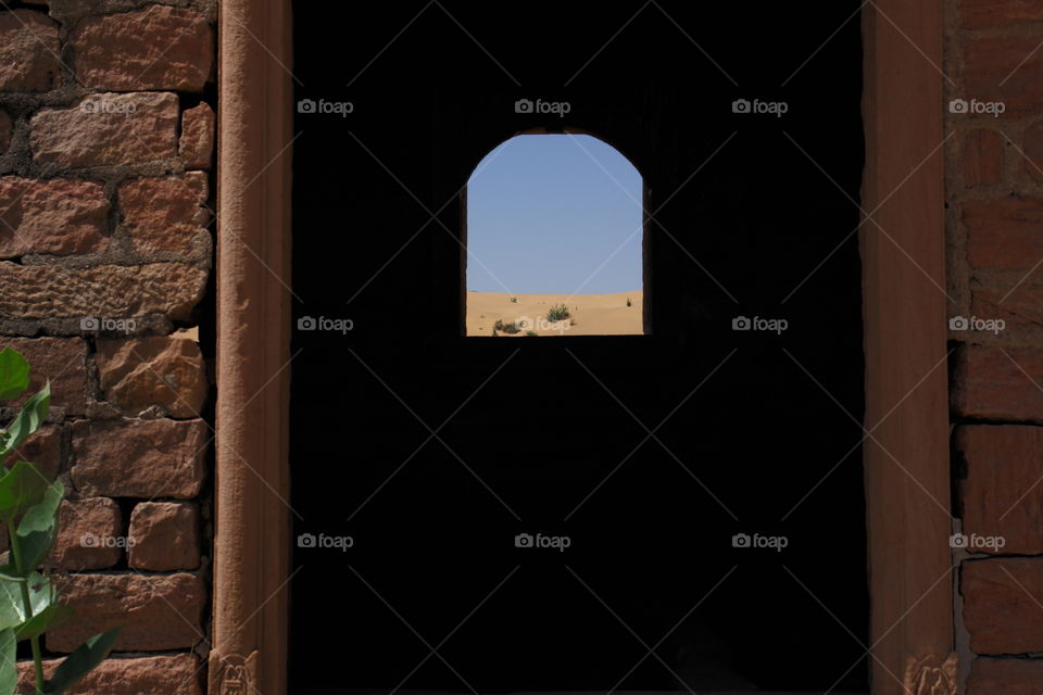Desert doorway . Abandoned temple in Thar desert India  