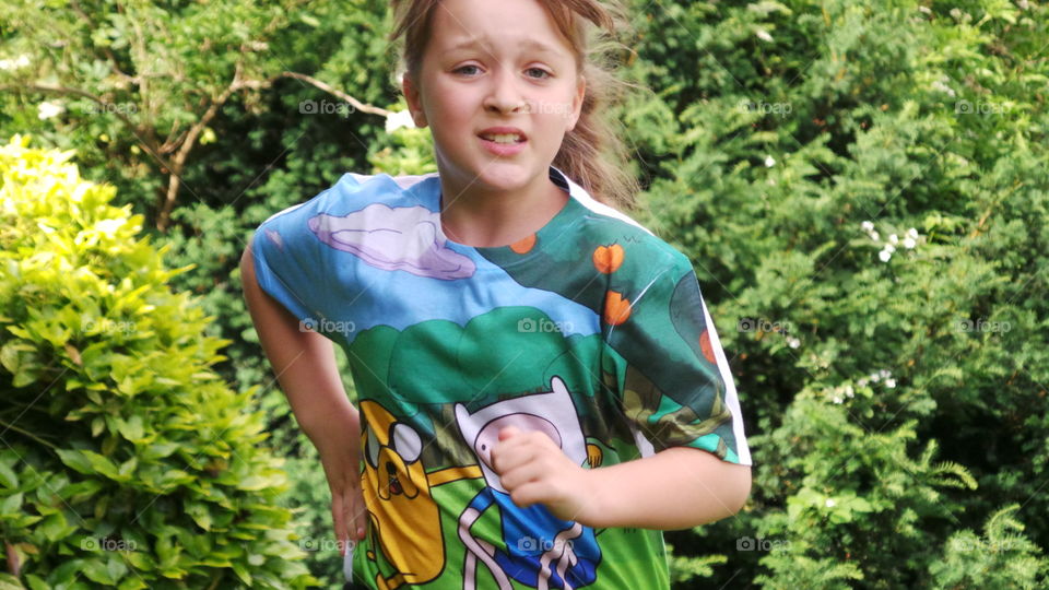 child running fast and training hard