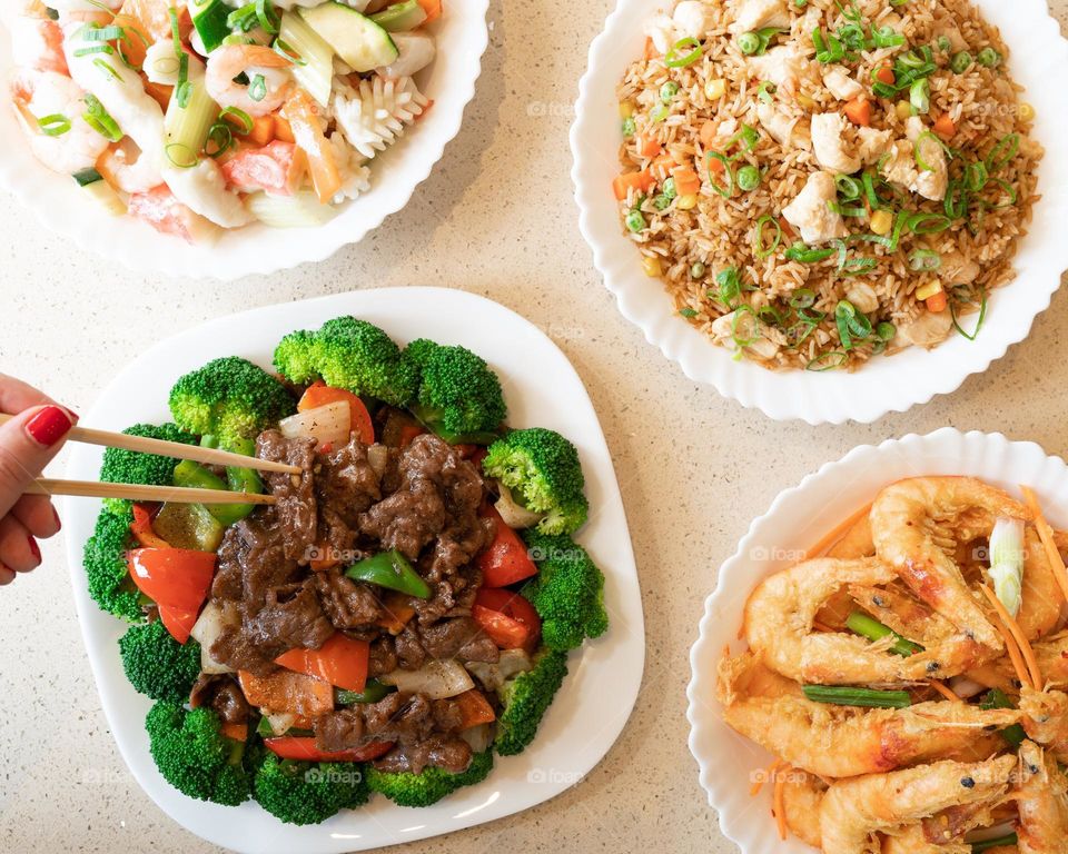 Delicious Asian cuisine with rice shrimp sea food beef