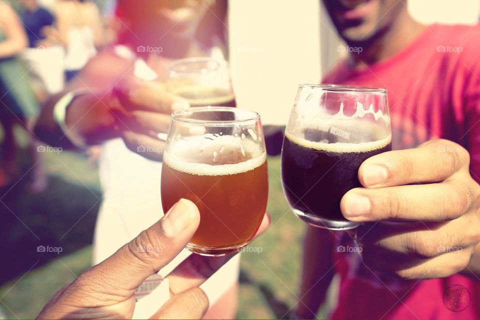 Close-up of a people holding wine