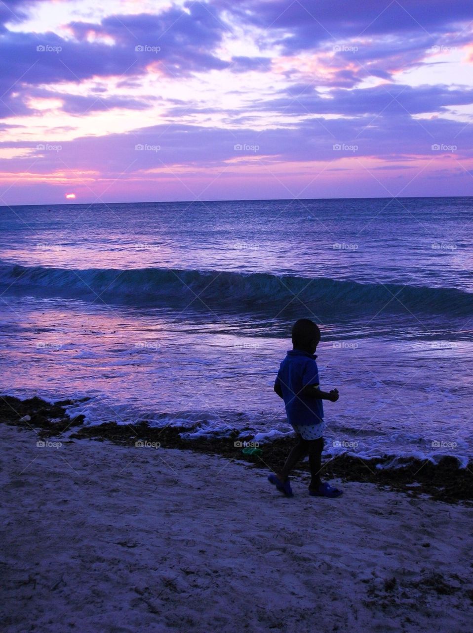 Jamaican boy at the beach 