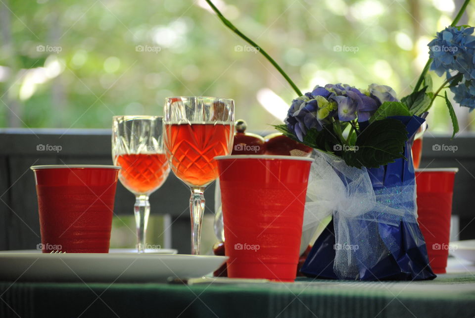 Wine Glasses and Red Solo Cups Place Settings