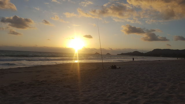 Sunrise and Fisherman