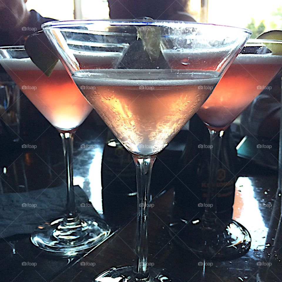Happy hour. Pomegranate Martinis