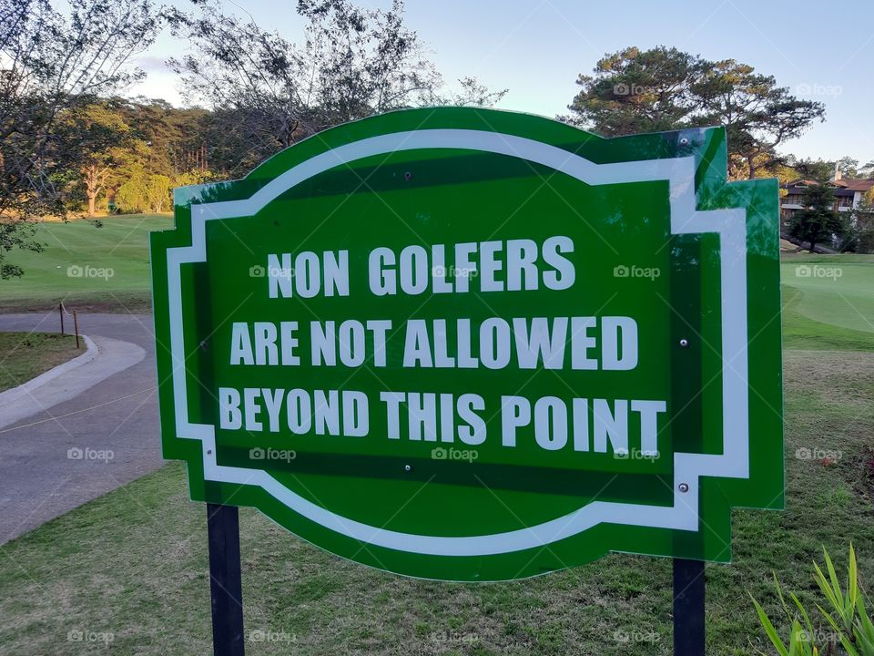Warning sign at a golf course.
