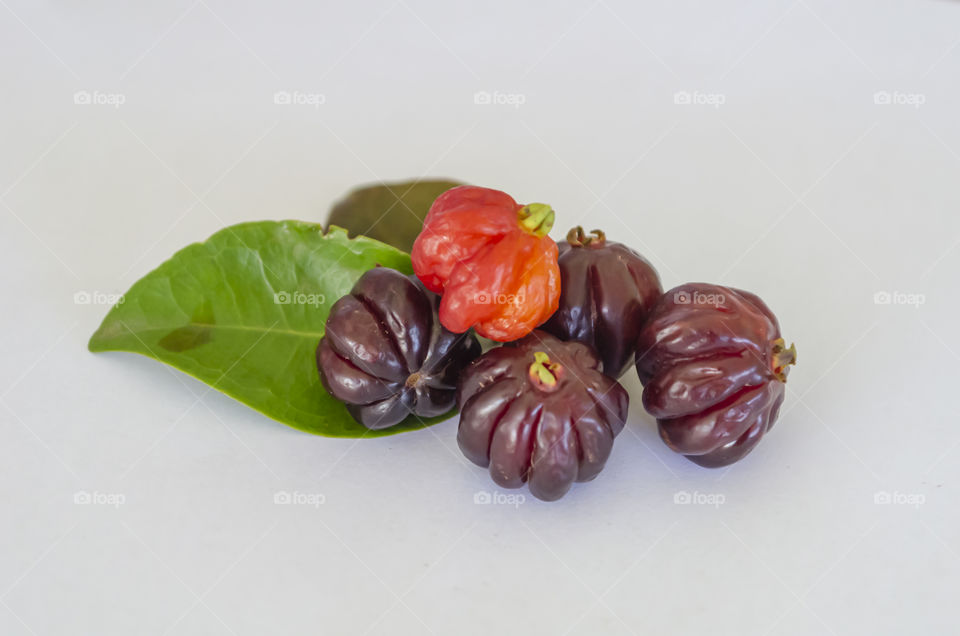 Leaves And Cayenne Cherry