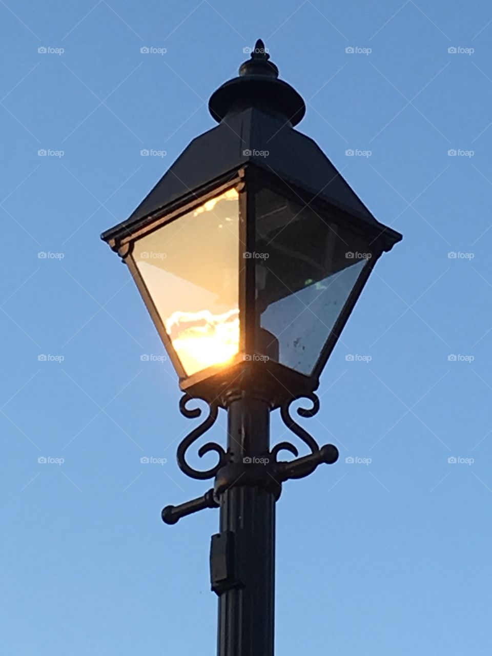 Sunset reflected in lamp