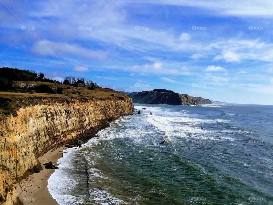 Mendocini coast with blue sky and waves